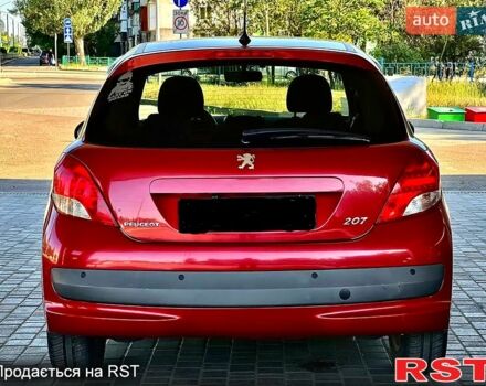 Красный Пежо 207, объемом двигателя 1.4 л и пробегом 103 тыс. км за 5600 $, фото 3 на Automoto.ua