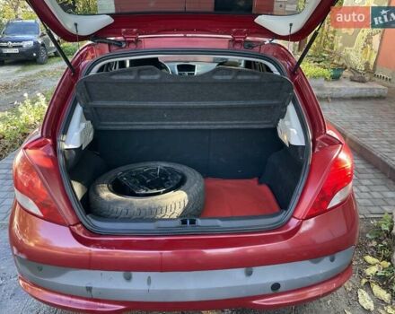 Пежо 207 2010 в Николаеве на Automoto.ua Красный Пежо 207, объемом двигателя 1.36 л и пробегом 103 тыс. км за 5800 $, фото 7 на Automoto.ua