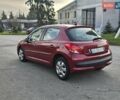 Красный Пежо 207, объемом двигателя 1.36 л и пробегом 183 тыс. км за 4200 $, фото 7 на Automoto.ua