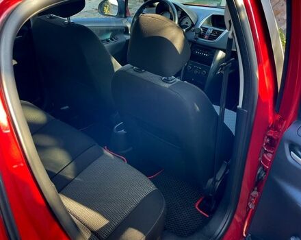 Красный Пежо 207, объемом двигателя 1.4 л и пробегом 103 тыс. км за 5600 $, фото 11 на Automoto.ua