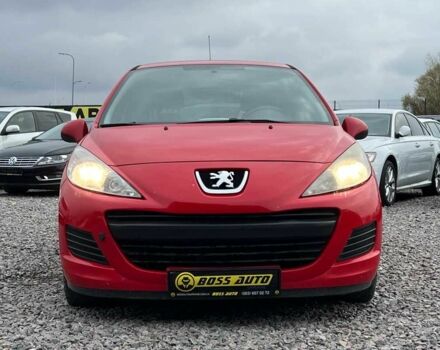 Красный Пежо 207, объемом двигателя 1.4 л и пробегом 209 тыс. км за 5800 $, фото 1 на Automoto.ua