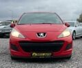 Красный Пежо 207, объемом двигателя 1.4 л и пробегом 209 тыс. км за 5800 $, фото 1 на Automoto.ua