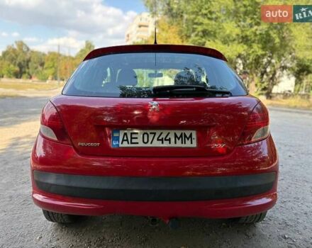 Красный Пежо 207, объемом двигателя 1.4 л и пробегом 251 тыс. км за 3999 $, фото 5 на Automoto.ua