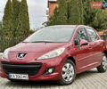 Красный Пежо 207, объемом двигателя 1.36 л и пробегом 184 тыс. км за 5650 $, фото 1 на Automoto.ua