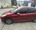 Красный Пежо 207, объемом двигателя 1.36 л и пробегом 122 тыс. км за 5200 $, фото 1 на Automoto.ua