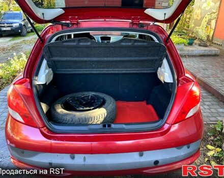 Красный Пежо 207, объемом двигателя 1.4 л и пробегом 103 тыс. км за 5600 $, фото 6 на Automoto.ua