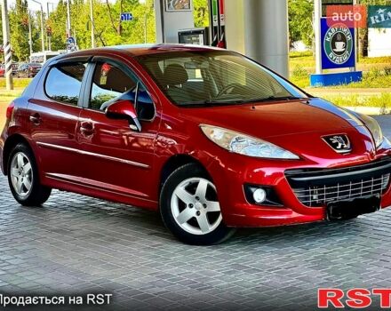 Красный Пежо 207, объемом двигателя 1.4 л и пробегом 103 тыс. км за 5600 $, фото 1 на Automoto.ua