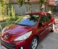 Красный Пежо 207, объемом двигателя 1.36 л и пробегом 125 тыс. км за 4950 $, фото 1 на Automoto.ua