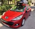 Красный Пежо 207, объемом двигателя 1.36 л и пробегом 254 тыс. км за 6100 $, фото 1 на Automoto.ua