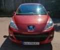 Красный Пежо 207, объемом двигателя 1.36 л и пробегом 111 тыс. км за 4500 $, фото 1 на Automoto.ua