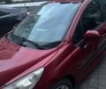Красный Пежо 207, объемом двигателя 1.4 л и пробегом 163 тыс. км за 4900 $, фото 1 на Automoto.ua