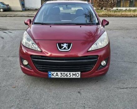 Красный Пежо 207, объемом двигателя 1.36 л и пробегом 180 тыс. км за 4300 $, фото 1 на Automoto.ua