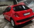Красный Пежо 207, объемом двигателя 1.4 л и пробегом 150 тыс. км за 5500 $, фото 1 на Automoto.ua