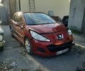 Красный Пежо 207, объемом двигателя 1.4 л и пробегом 326 тыс. км за 2000 $, фото 1 на Automoto.ua