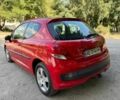 Червоний Пежо 207, об'ємом двигуна 1.4 л та пробігом 249 тис. км за 3999 $, фото 2 на Automoto.ua