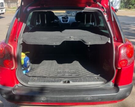 Червоний Пежо 207, об'ємом двигуна 1.4 л та пробігом 146 тис. км за 5000 $, фото 8 на Automoto.ua