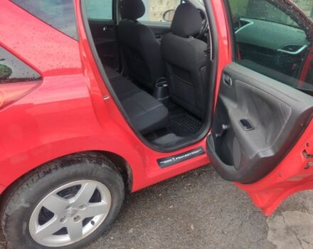 Червоний Пежо 207, об'ємом двигуна 1.4 л та пробігом 146 тис. км за 5000 $, фото 11 на Automoto.ua