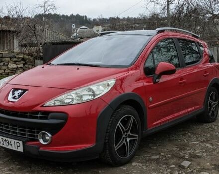 Красный Пежо 207, объемом двигателя 1.6 л и пробегом 230 тыс. км за 5300 $, фото 1 на Automoto.ua