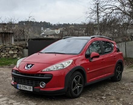 Красный Пежо 207, объемом двигателя 1.6 л и пробегом 230 тыс. км за 5300 $, фото 1 на Automoto.ua