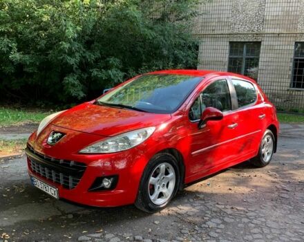 Красный Пежо 207, объемом двигателя 1.4 л и пробегом 150 тыс. км за 5500 $, фото 1 на Automoto.ua