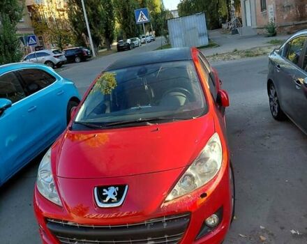 Красный Пежо 207, объемом двигателя 1.6 л и пробегом 100 тыс. км за 7000 $, фото 1 на Automoto.ua