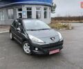 Сірий Пежо 207, об'ємом двигуна 1.4 л та пробігом 175 тис. км за 5699 $, фото 1 на Automoto.ua