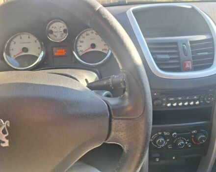 Синий Пежо 207, объемом двигателя 1.4 л и пробегом 260 тыс. км за 4500 $, фото 4 на Automoto.ua