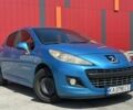 Синий Пежо 207, объемом двигателя 1.4 л и пробегом 295 тыс. км за 3750 $, фото 1 на Automoto.ua