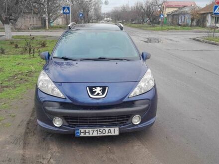 Синий Пежо 207, объемом двигателя 1.4 л и пробегом 241 тыс. км за 5500 $, фото 1 на Automoto.ua