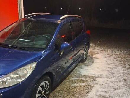 Синий Пежо 207, объемом двигателя 1.36 л и пробегом 190 тыс. км за 4500 $, фото 1 на Automoto.ua