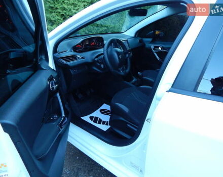 Пежо 208 2012 в Трускавце на Automoto.ua Белый Пежо 208, объемом двигателя 1.4 л и пробегом 160 тыс. км за 5890 $, фото 43 на Automoto.ua