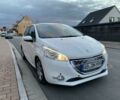 Білий Пежо 208, об'ємом двигуна 1.4 л та пробігом 163 тис. км за 16407 $, фото 1 на Automoto.ua