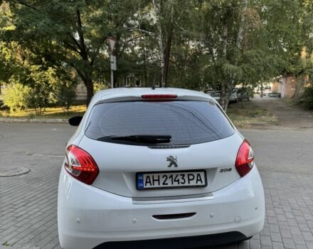 Белый Пежо 208, объемом двигателя 1.4 л и пробегом 300 тыс. км за 7000 $, фото 4 на Automoto.ua