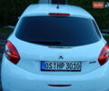 Пежо 208 2012 в Трускавце на Automoto.ua Белый Пежо 208, объемом двигателя 1.4 л и пробегом 160 тыс. км за 5890 $, фото 33 на Automoto.ua