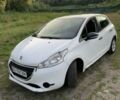 Белый Пежо 208, объемом двигателя 1.4 л и пробегом 168 тыс. км за 5499 $, фото 1 на Automoto.ua