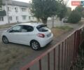 Белый Пежо 208, объемом двигателя 1.4 л и пробегом 129 тыс. км за 6650 $, фото 1 на Automoto.ua