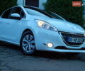 Пежо 208 2012 в Трускавце на Automoto.ua Белый Пежо 208, объемом двигателя 1.4 л и пробегом 160 тыс. км за 5890 $, фото 4 на Automoto.ua