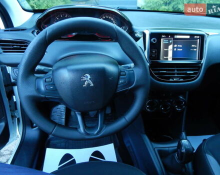 Пежо 208 2012 в Трускавце на Automoto.ua Белый Пежо 208, объемом двигателя 1.4 л и пробегом 160 тыс. км за 5890 $, фото 50 на Automoto.ua