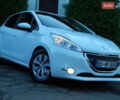 Пежо 208 2012 в Трускавце на Automoto.ua Белый Пежо 208, объемом двигателя 1.4 л и пробегом 160 тыс. км за 5890 $, фото 5 на Automoto.ua