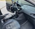 Белый Пежо 208, объемом двигателя 1.4 л и пробегом 300 тыс. км за 7000 $, фото 12 на Automoto.ua