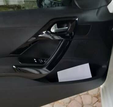 Білий Пежо 208, об'ємом двигуна 1.4 л та пробігом 259 тис. км за 7100 $, фото 8 на Automoto.ua