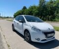 Белый Пежо 208, объемом двигателя 1.4 л и пробегом 168 тыс. км за 6600 $, фото 1 на Automoto.ua