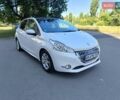 Белый Пежо 208, объемом двигателя 1.4 л и пробегом 113 тыс. км за 6450 $, фото 1 на Automoto.ua