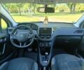Белый Пежо 208, объемом двигателя 1.4 л и пробегом 113 тыс. км за 6450 $, фото 10 на Automoto.ua