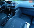 Пежо 208 2012 в Трускавце на Automoto.ua Белый Пежо 208, объемом двигателя 1.4 л и пробегом 160 тыс. км за 5890 $, фото 64 на Automoto.ua