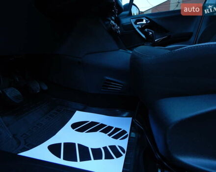 Пежо 208 2012 в Трускавце на Automoto.ua Белый Пежо 208, объемом двигателя 1.4 л и пробегом 160 тыс. км за 5890 $, фото 57 на Automoto.ua