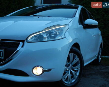 Пежо 208 2012 в Трускавце на Automoto.ua Белый Пежо 208, объемом двигателя 1.4 л и пробегом 160 тыс. км за 5890 $, фото 19 на Automoto.ua