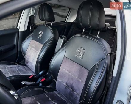 Белый Пежо 208, объемом двигателя 1.56 л и пробегом 175 тыс. км за 7900 $, фото 23 на Automoto.ua