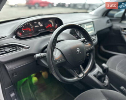 Белый Пежо 208, объемом двигателя 1 л и пробегом 102 тыс. км за 5500 $, фото 14 на Automoto.ua