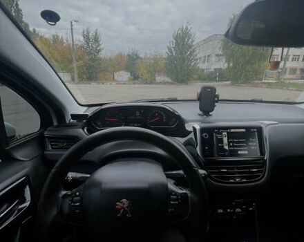 Білий Пежо 208, об'ємом двигуна 1.6 л та пробігом 77 тис. км за 8800 $, фото 13 на Automoto.ua